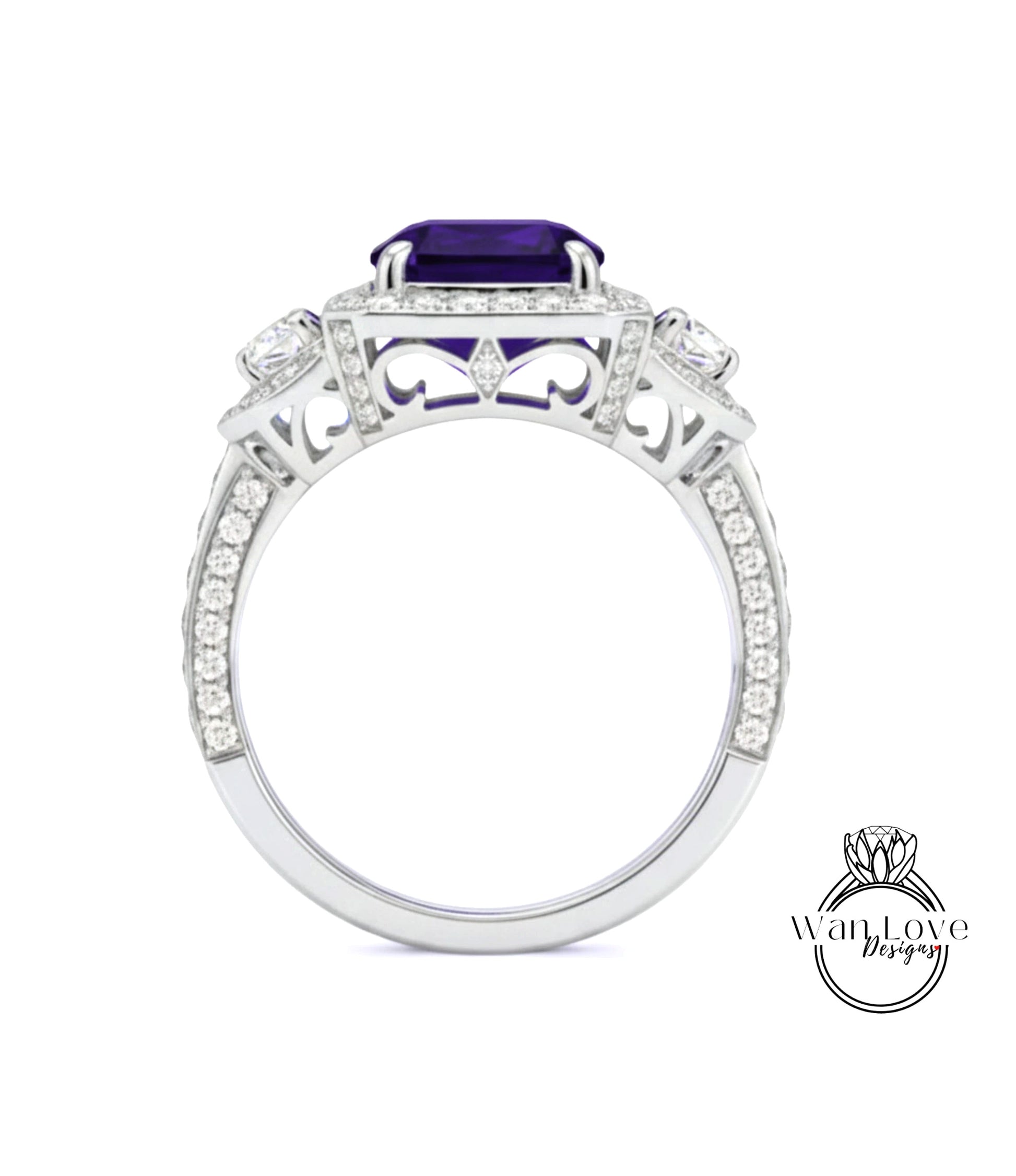 A silver ring with a large purple gemstone, surrounded by smaller diamonds and intricate designs.