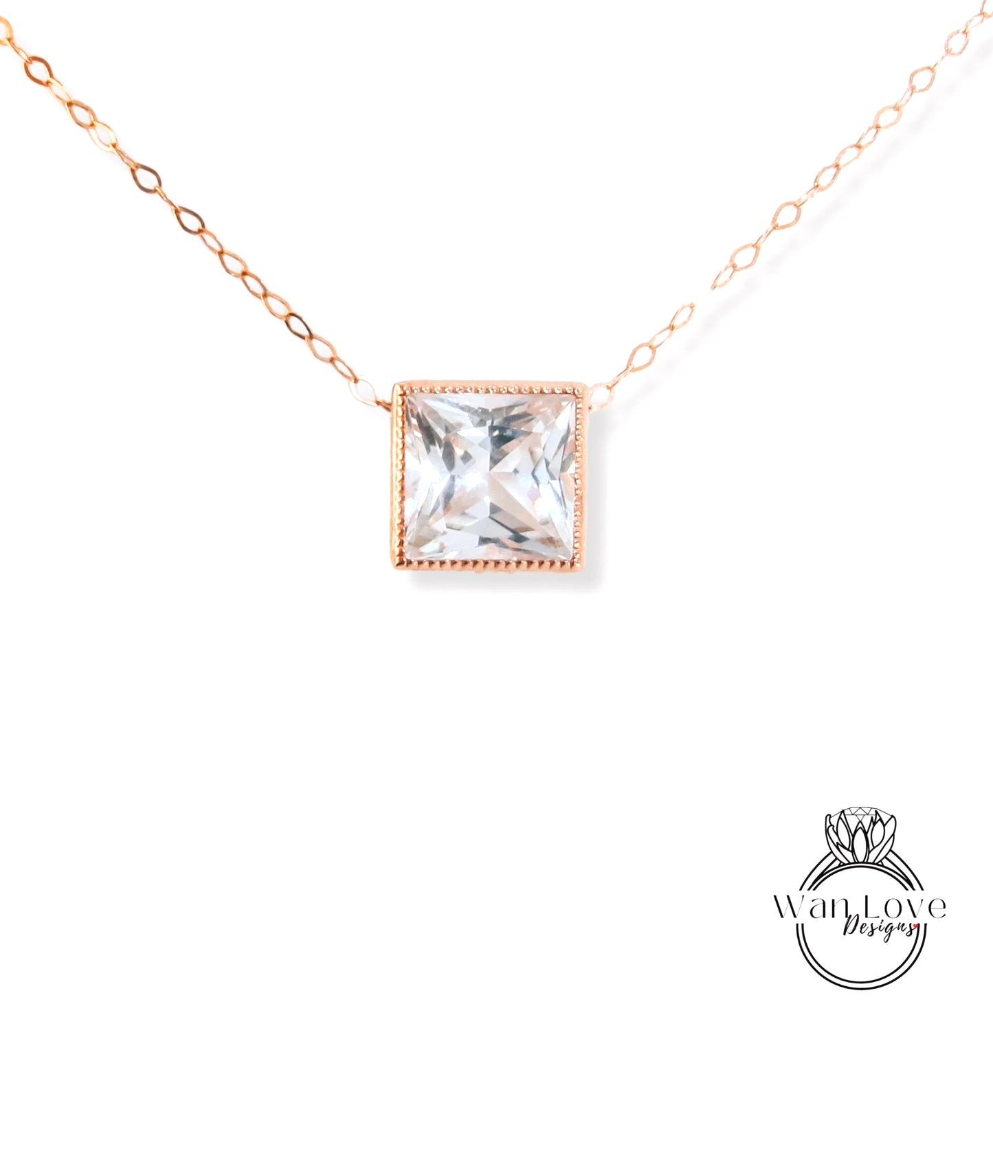 A necklace with a large, clear gemstone pendant in the center.