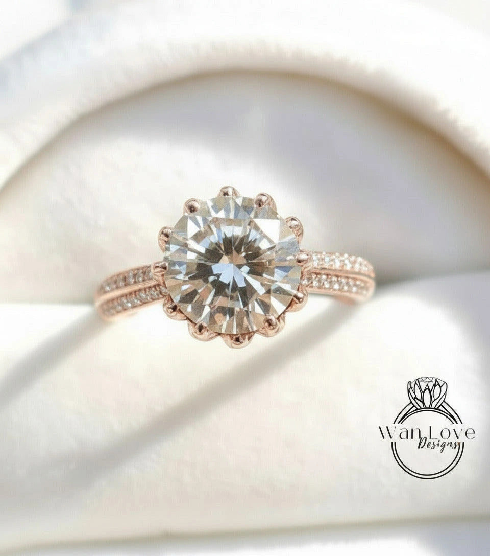 A close-up image of a beautiful engagement ring with a large, round diamond set in a rose gold band.