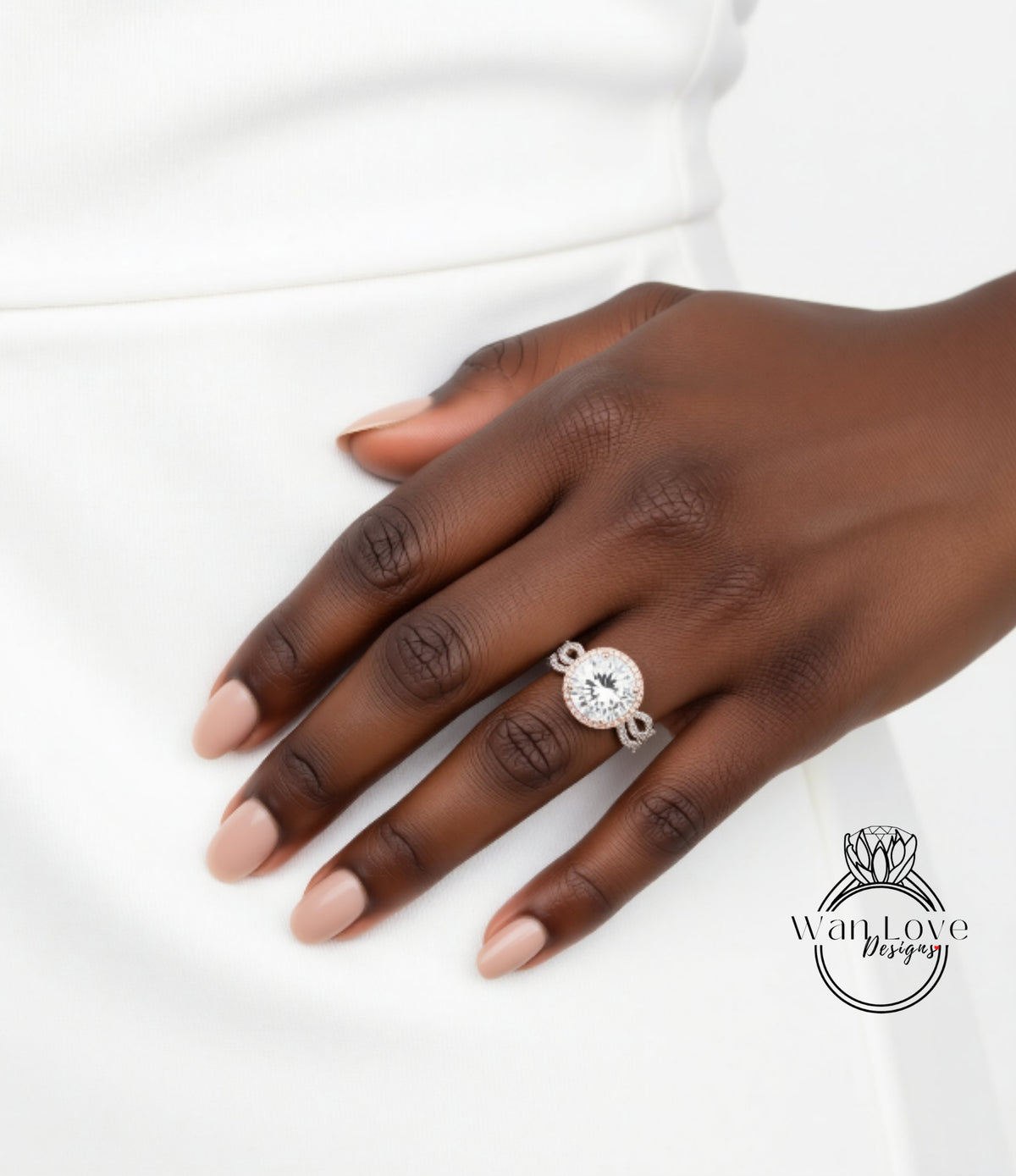 A close-up of a hand wearing a large, sparkling diamond ring.