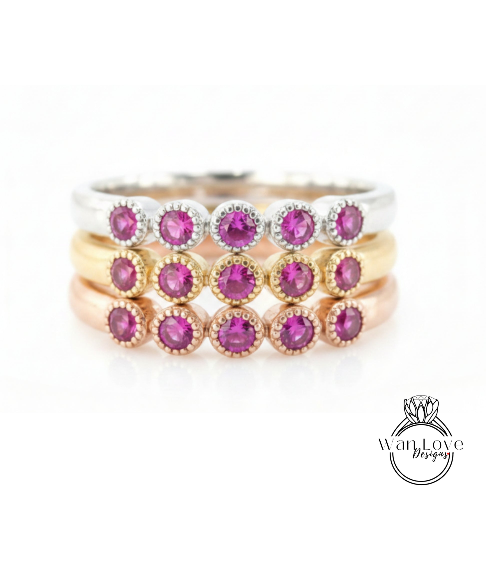 A ring with multiple layers of rings, each ring featuring a small, round, purple gemstone.