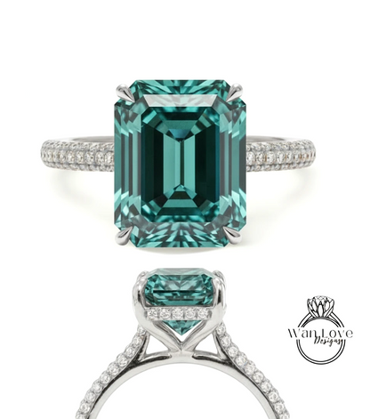 A stunning engagement ring with a large, vibrant green gemstone set in a silver band adorned with small diamonds.
