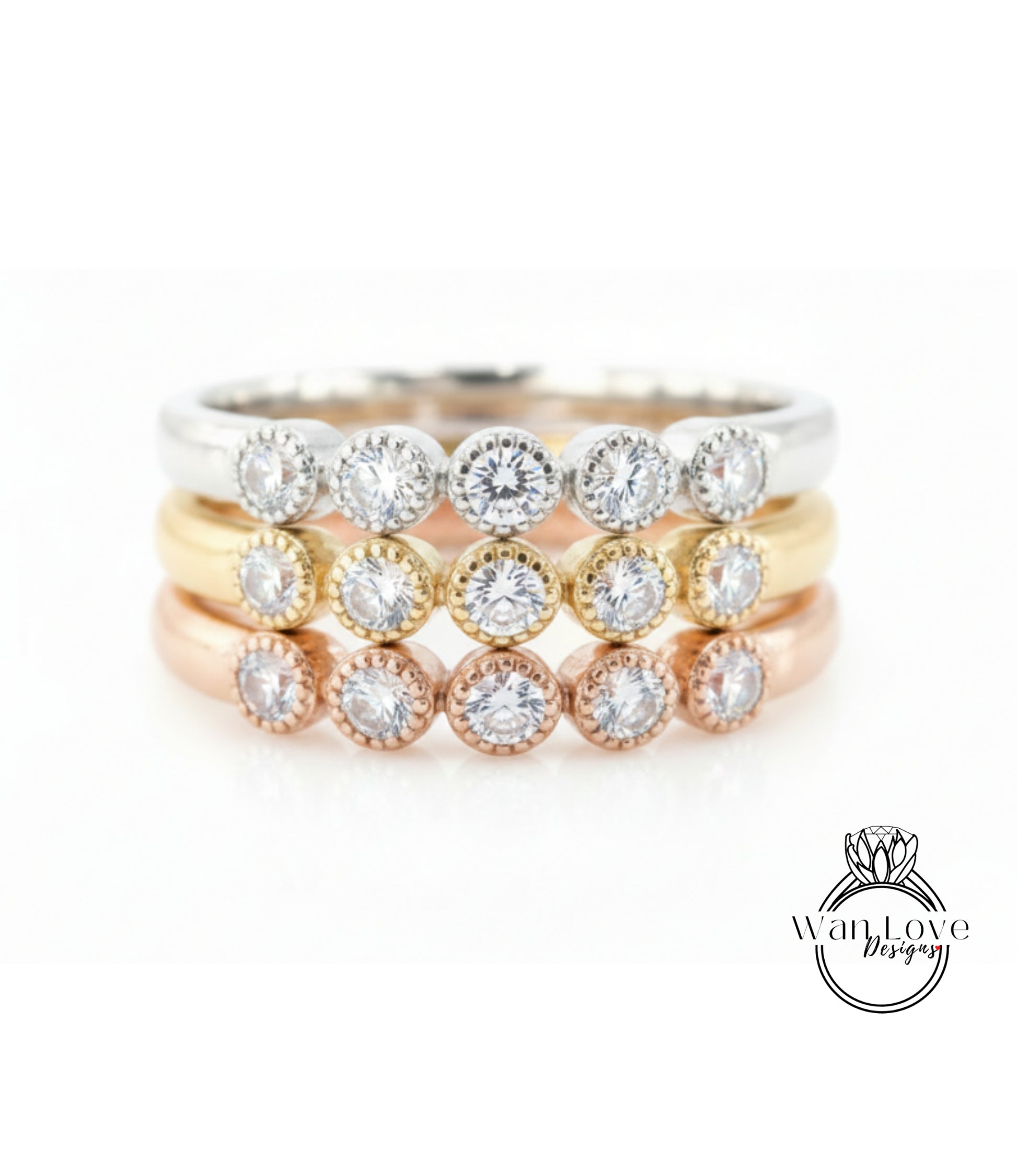 A ring with multiple tiers of rings, each ring featuring a diamond. The rings are arranged in a layered fashion, with the topmost ring being the largest and the bottommost ring being the smallest.