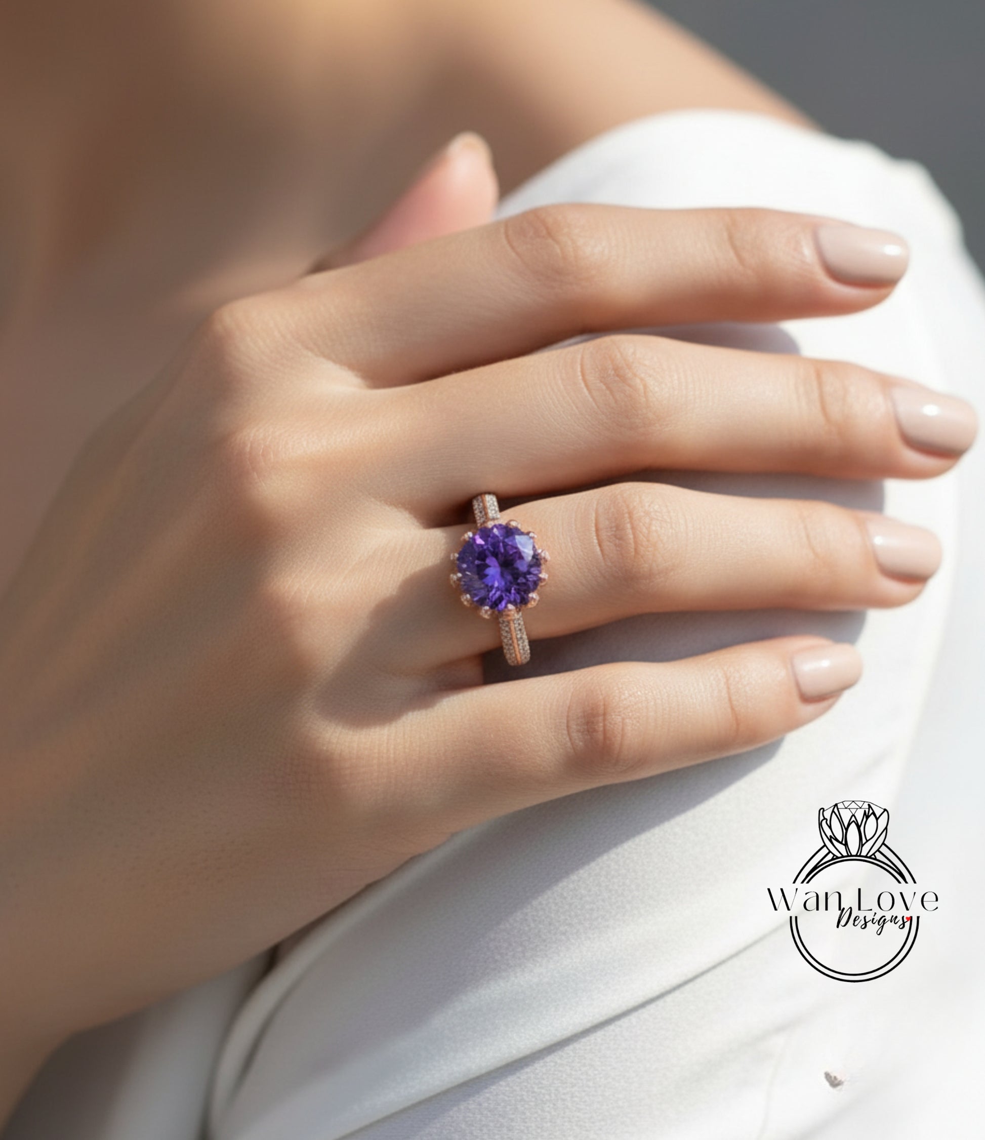 A close-up of a person's hand wearing a ring with a large purple gemstone.