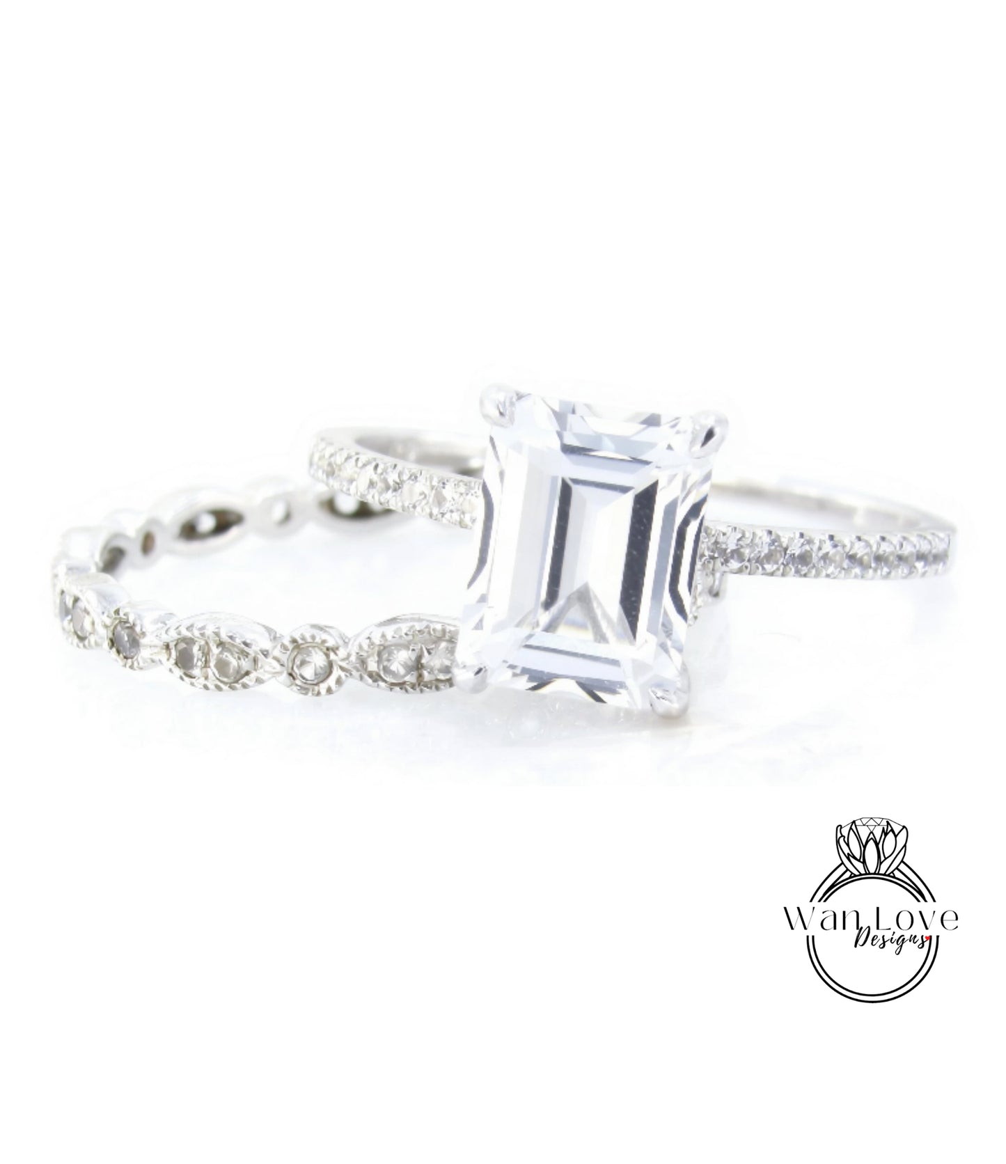 A close-up view of a diamond engagement ring with a large, clear gemstone set in a silver band.