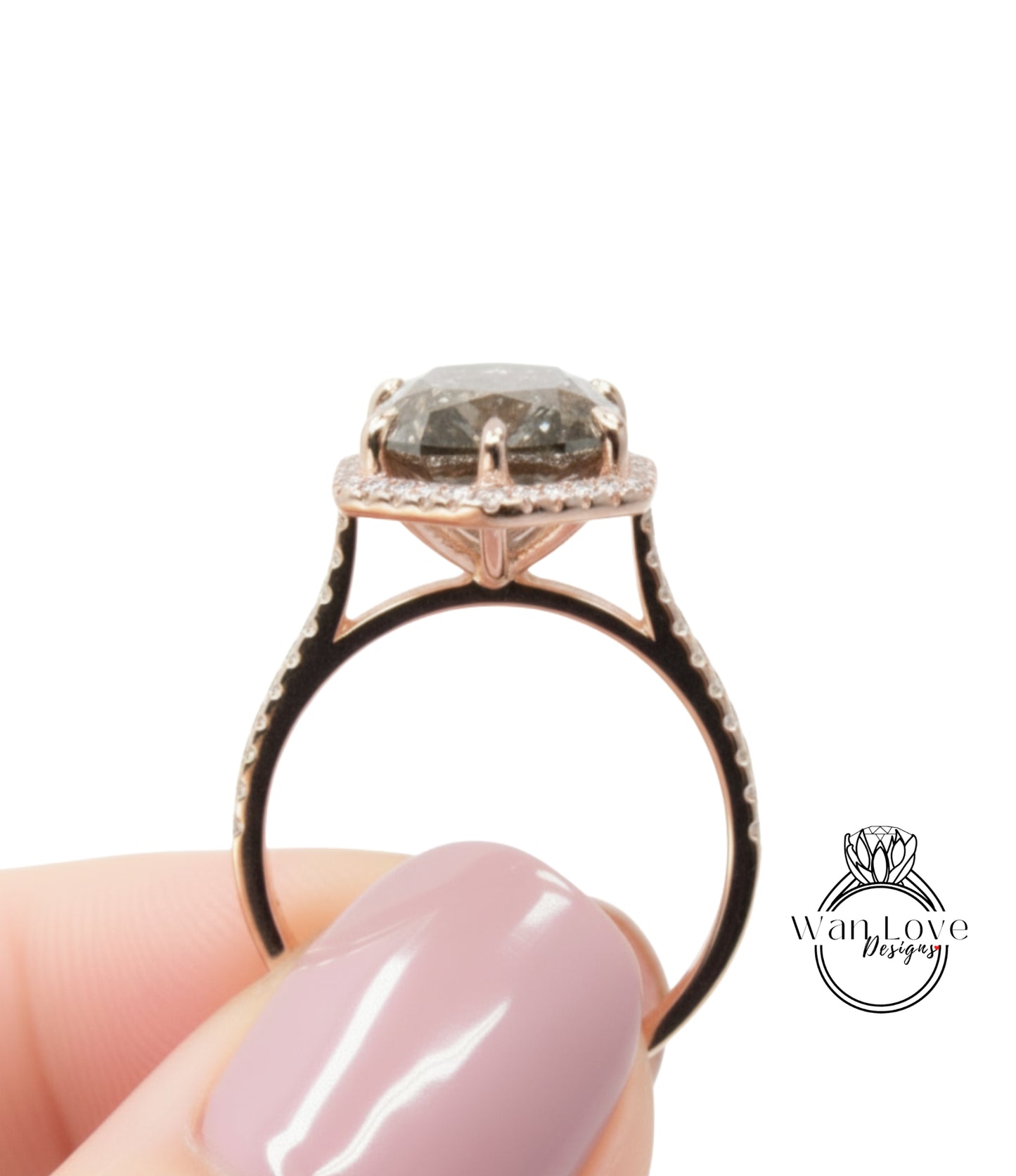 A close-up of a person's hand holding a gold ring with a large, round diamond in the center.