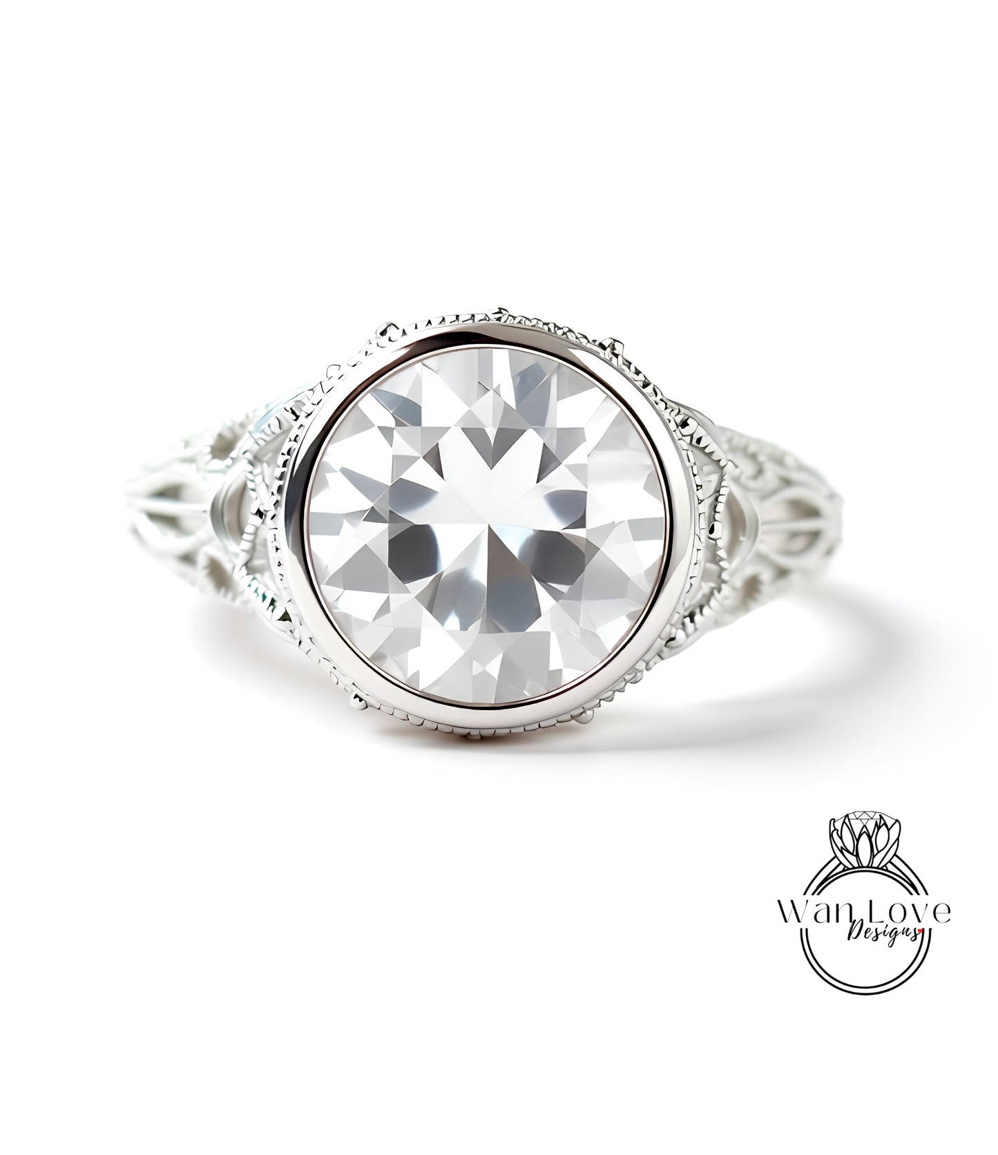 A close-up of a large, clear gemstone set in an ornate, silver-toned ring.