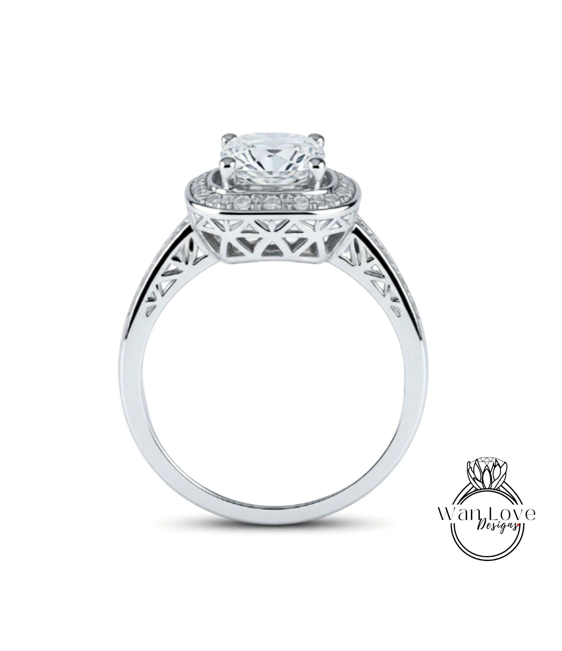 A silver engagement ring with a large central diamond surrounded by smaller diamonds, set in an intricate metal band.