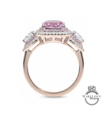 A beautiful pink gemstone ring with a halo of smaller diamonds around the center stone.
