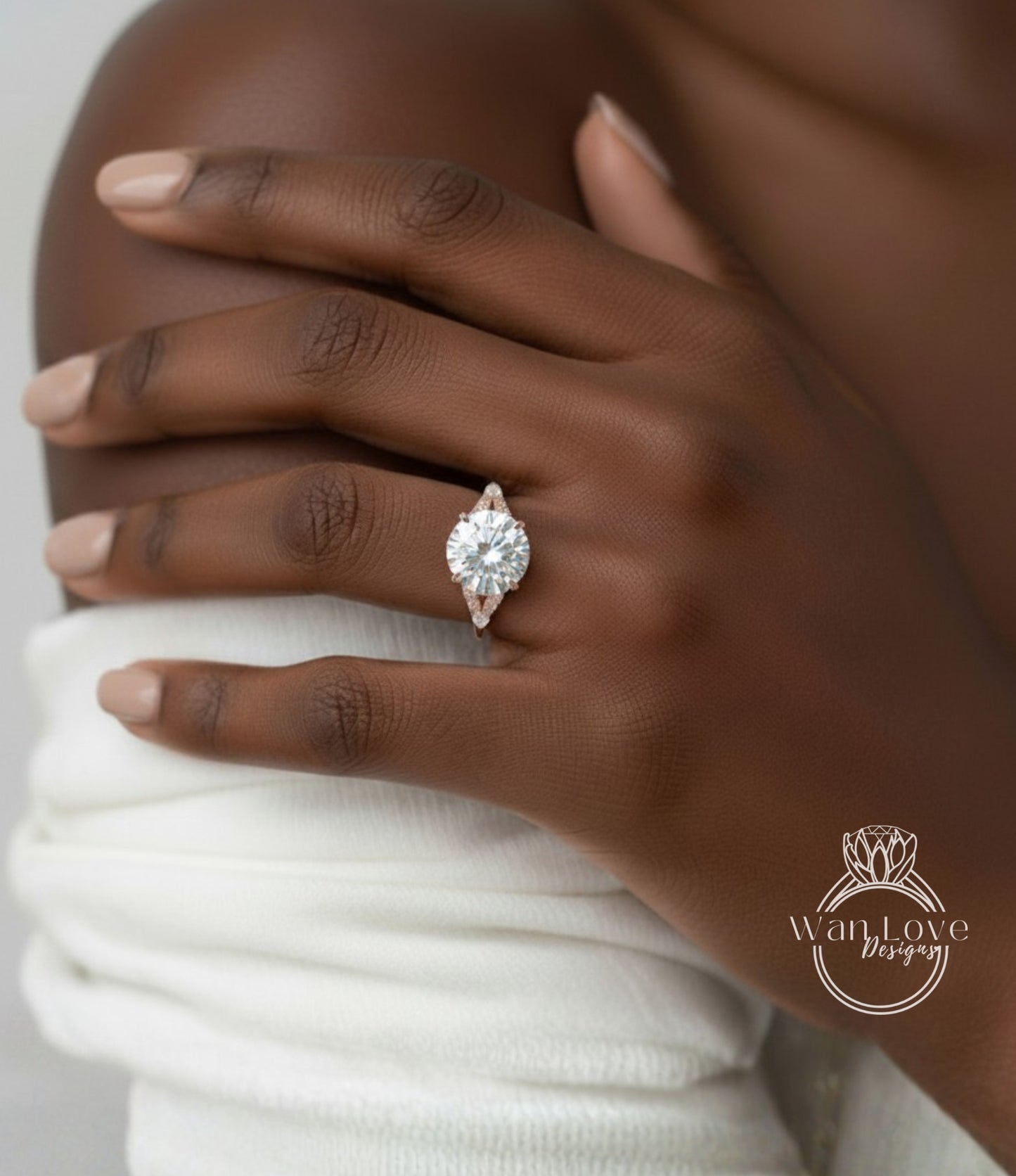 A close-up of a person's hand wearing a large, sparkling diamond engagement ring.