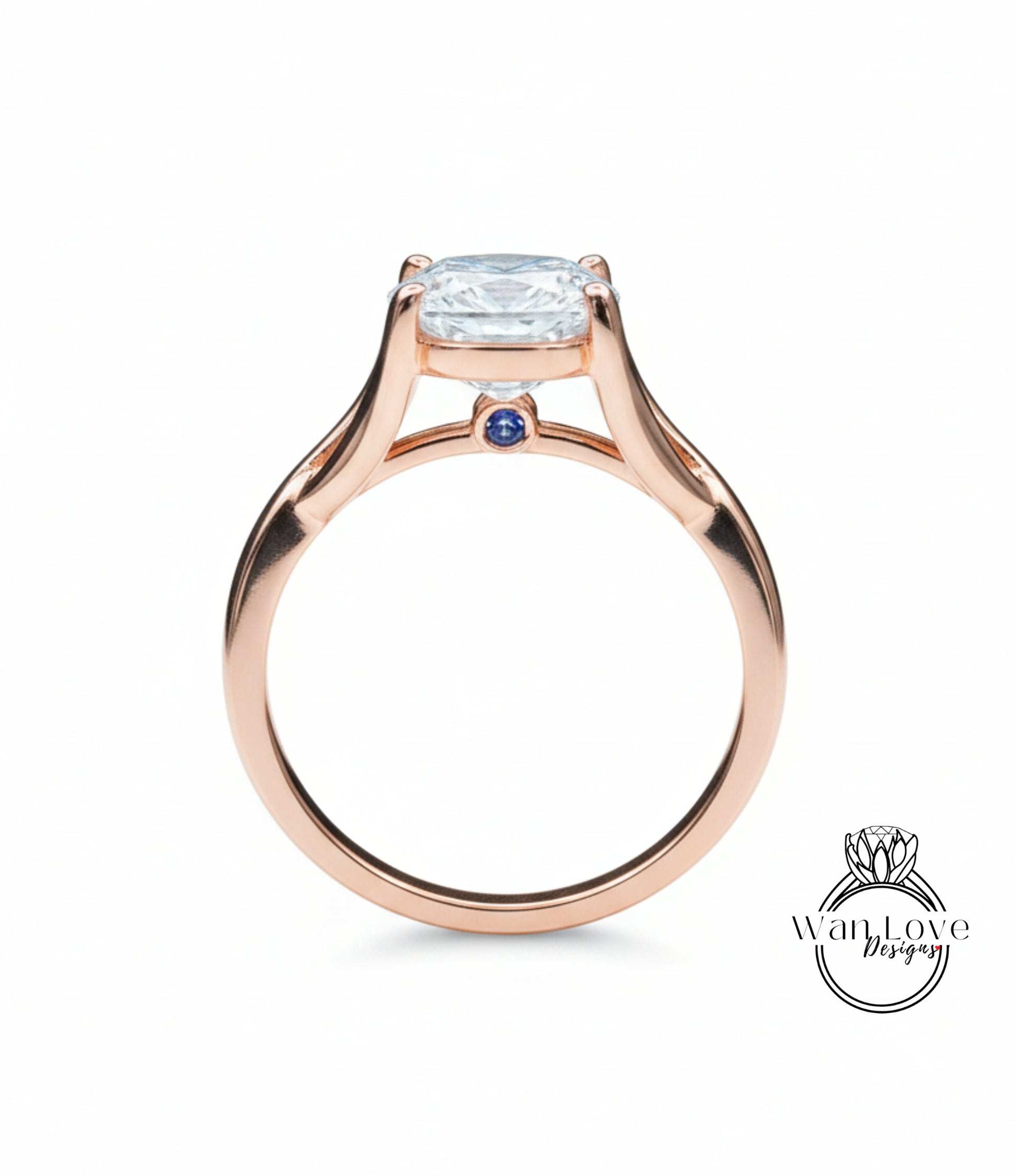 A rose gold engagement ring with a large round diamond set in the center, surrounded by smaller diamonds.