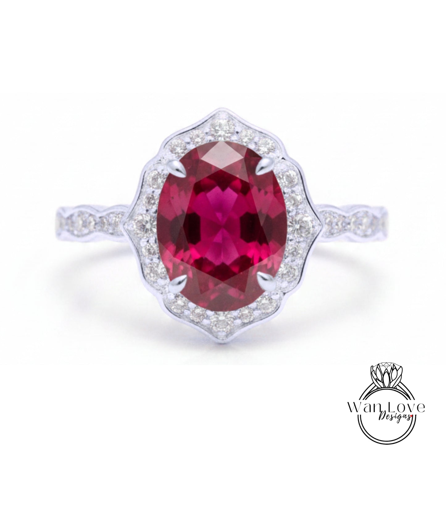 A stunning ring featuring a large oval-shaped red gemstone surrounded by a halo of smaller diamonds set in a silver band.