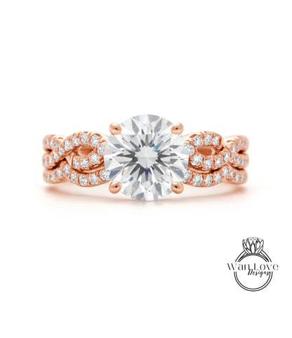 A close-up of a beautiful engagement ring with a large, brilliant-cut diamond set in a twisted, rose gold band adorned with small diamonds.