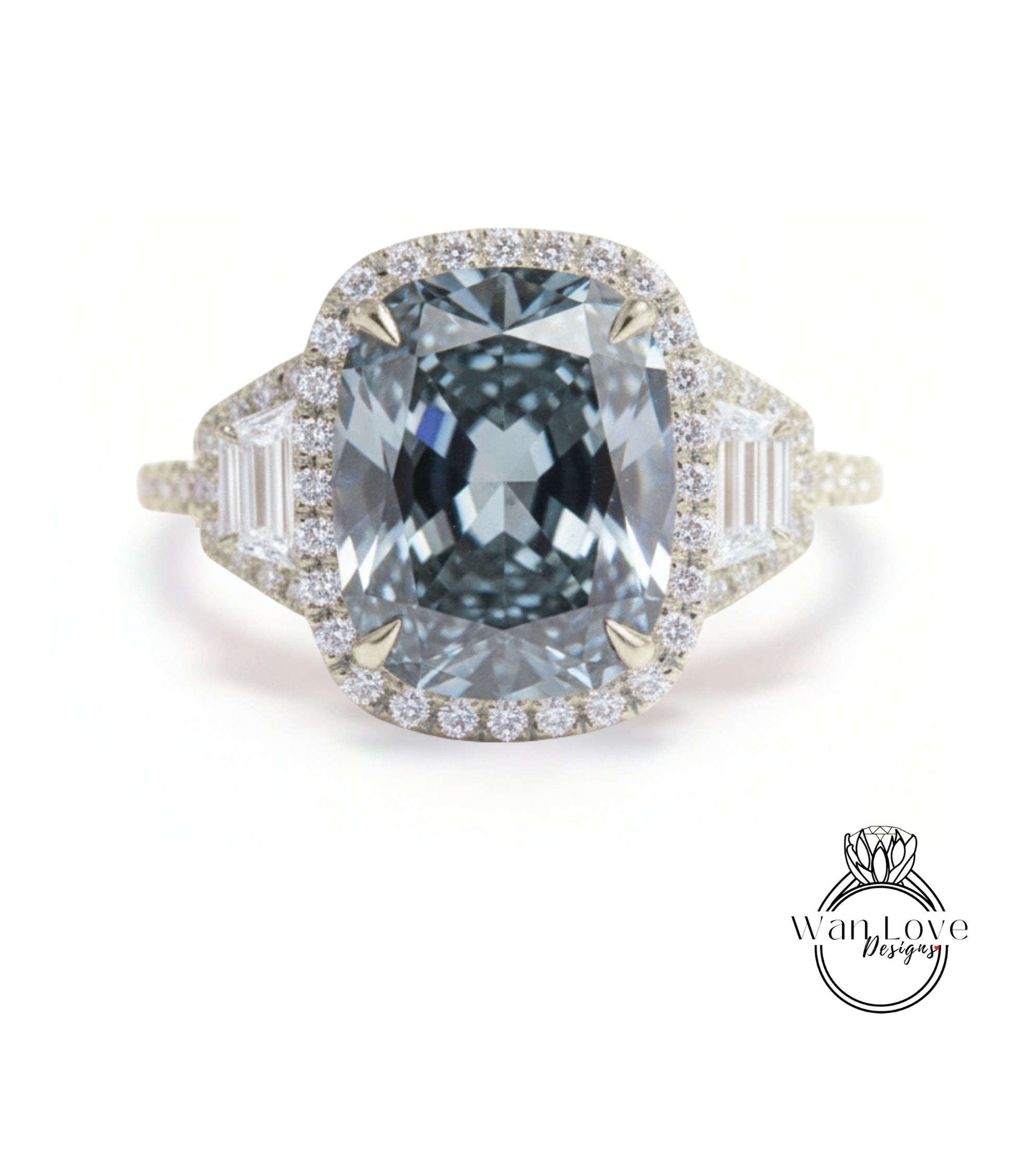 A stunning engagement ring with a large, blue diamond set in a halo of smaller diamonds, surrounded by a bezel of smaller diamonds.