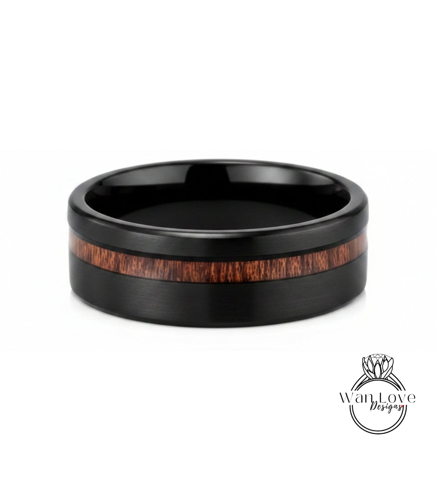 A black ring with a wooden band in the center, showcasing a natural wood grain pattern.