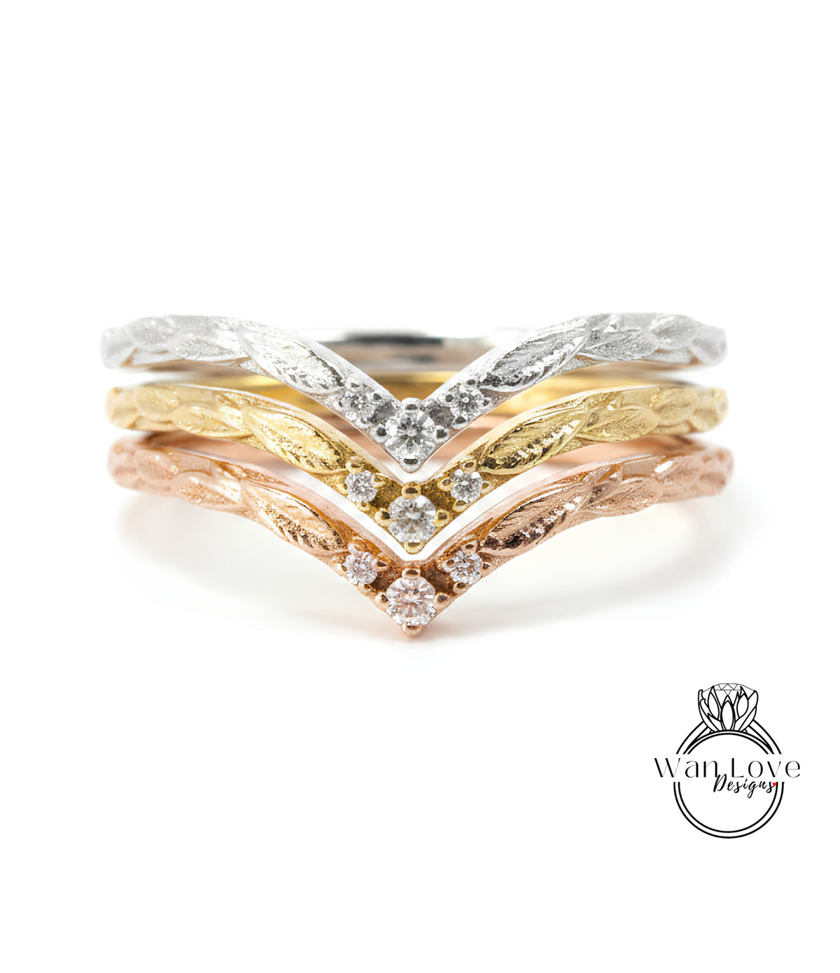 A close-up image of a ring with three distinct layers of rings, each with a unique design and color.