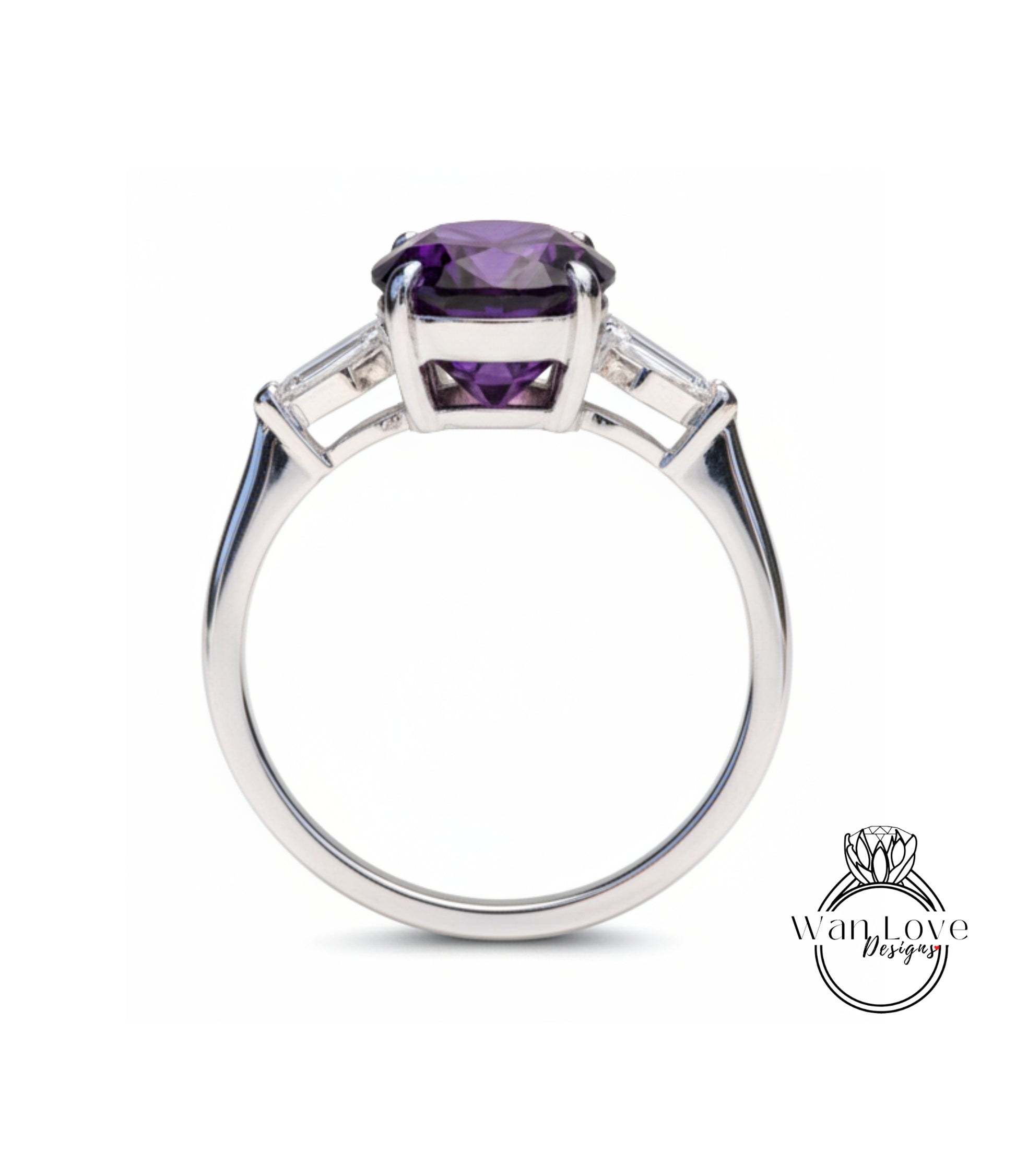 A silver ring with a large purple gemstone, possibly an amethyst, set in a three-stone design.