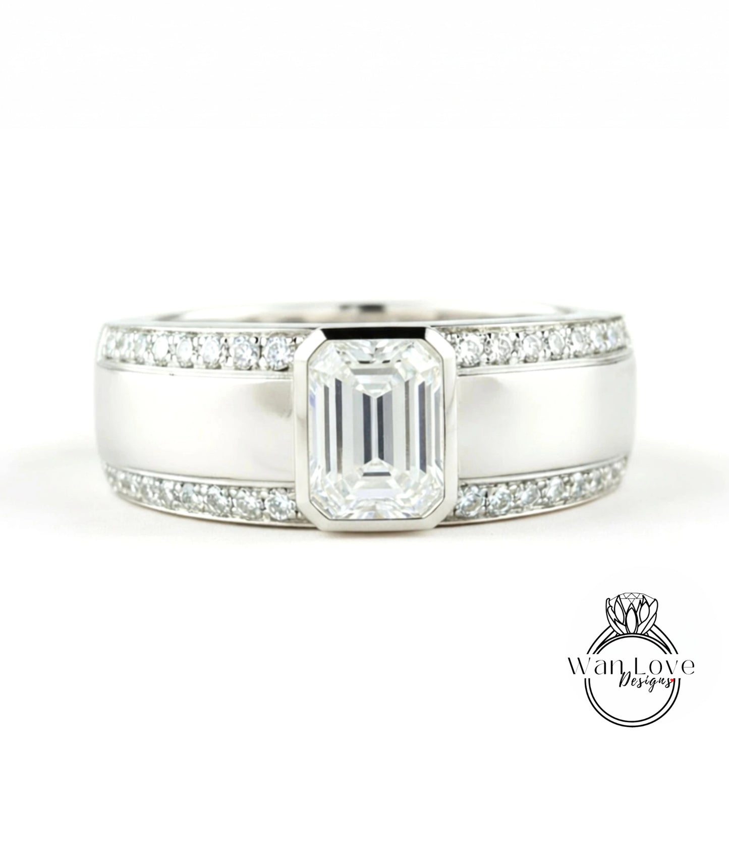 A close-up view of a silver ring with a large, clear gemstone set in the center.