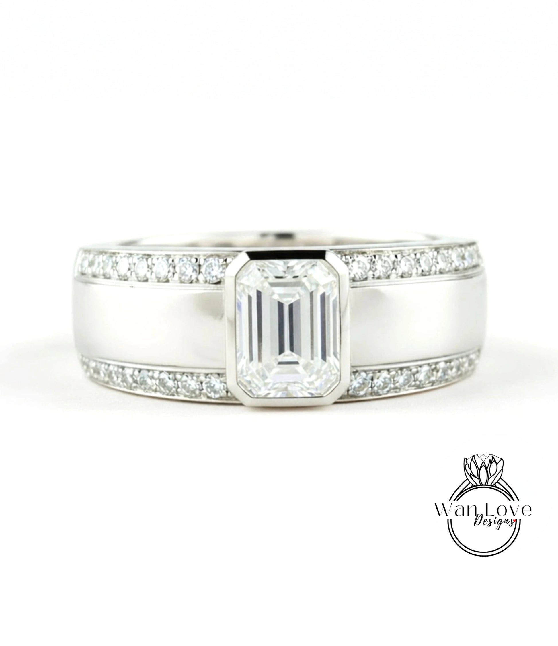 A close-up view of a silver ring with a large, clear gemstone set in the center.