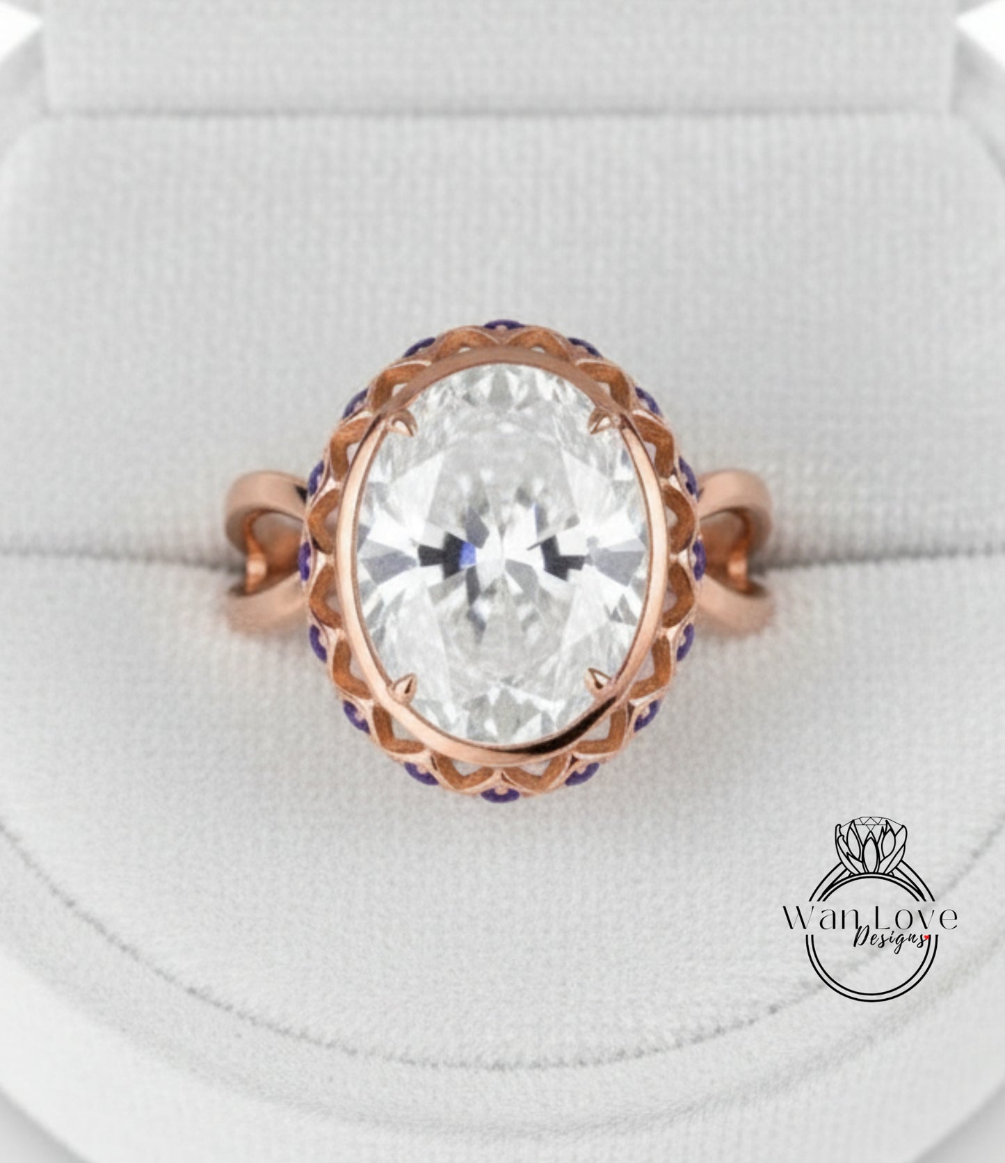 A large, round, clear gemstone ring with a rose gold band and a decorative pattern around the center.