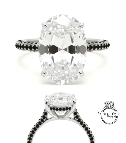 A large oval-shaped diamond engagement ring with a black band and smaller diamonds around the band.