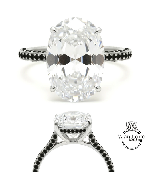 A large oval-shaped diamond engagement ring with a black band and smaller diamonds around the band.