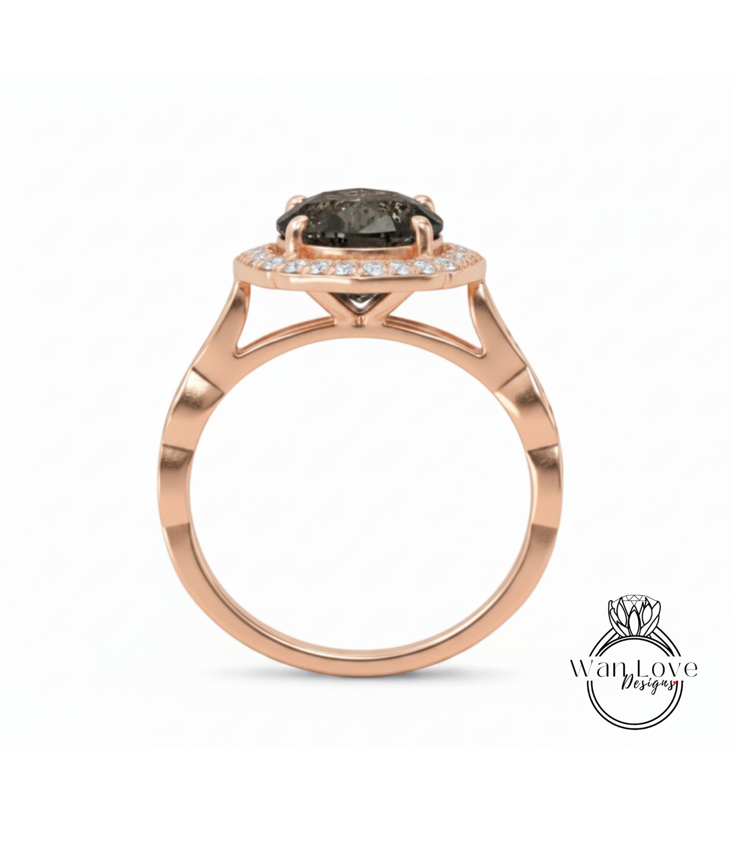 A rose gold ring with a large black gemstone in the center, set in a halo of smaller diamonds.