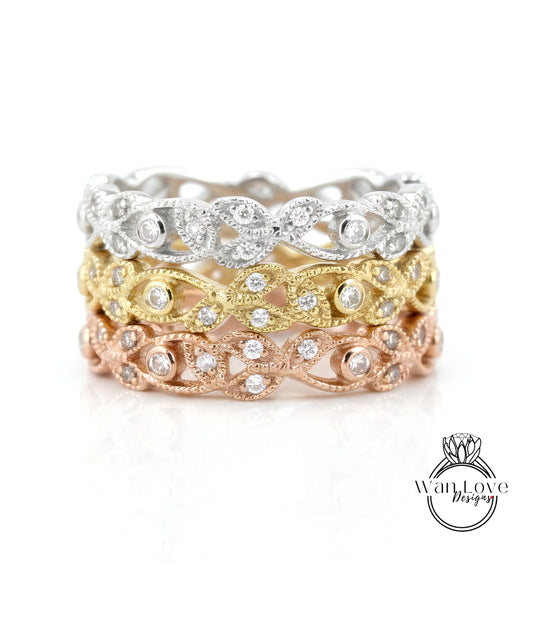 A close-up image of a ring with multiple layers of rings, each with a unique design and color.
