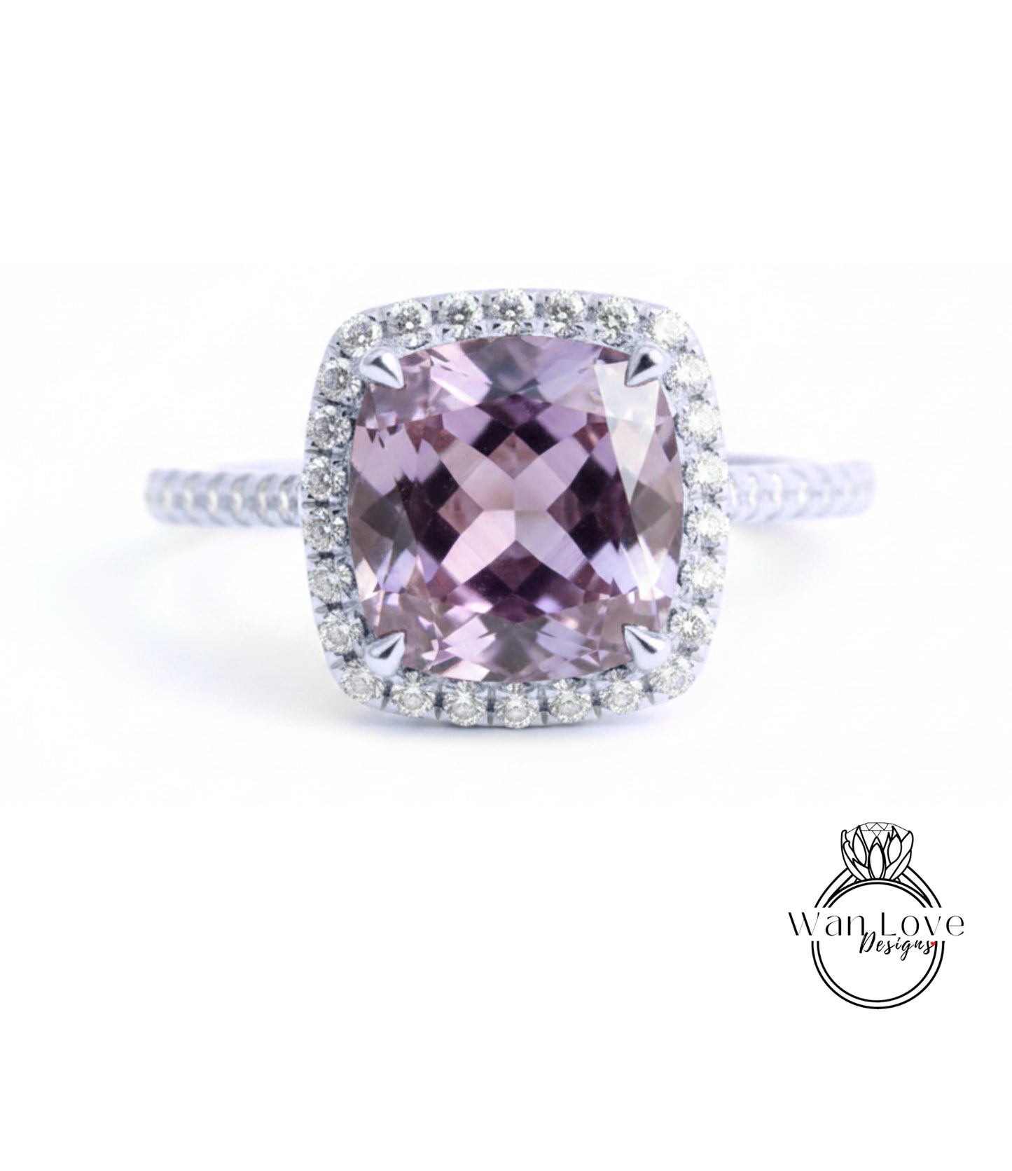 A stunning ring featuring a large, purple gemstone surrounded by a halo of diamonds.
