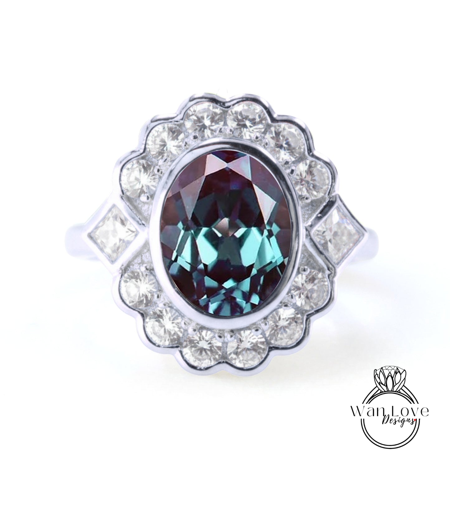 A silver ring with a large oval-shaped gemstone at the center, surrounded by smaller diamonds.