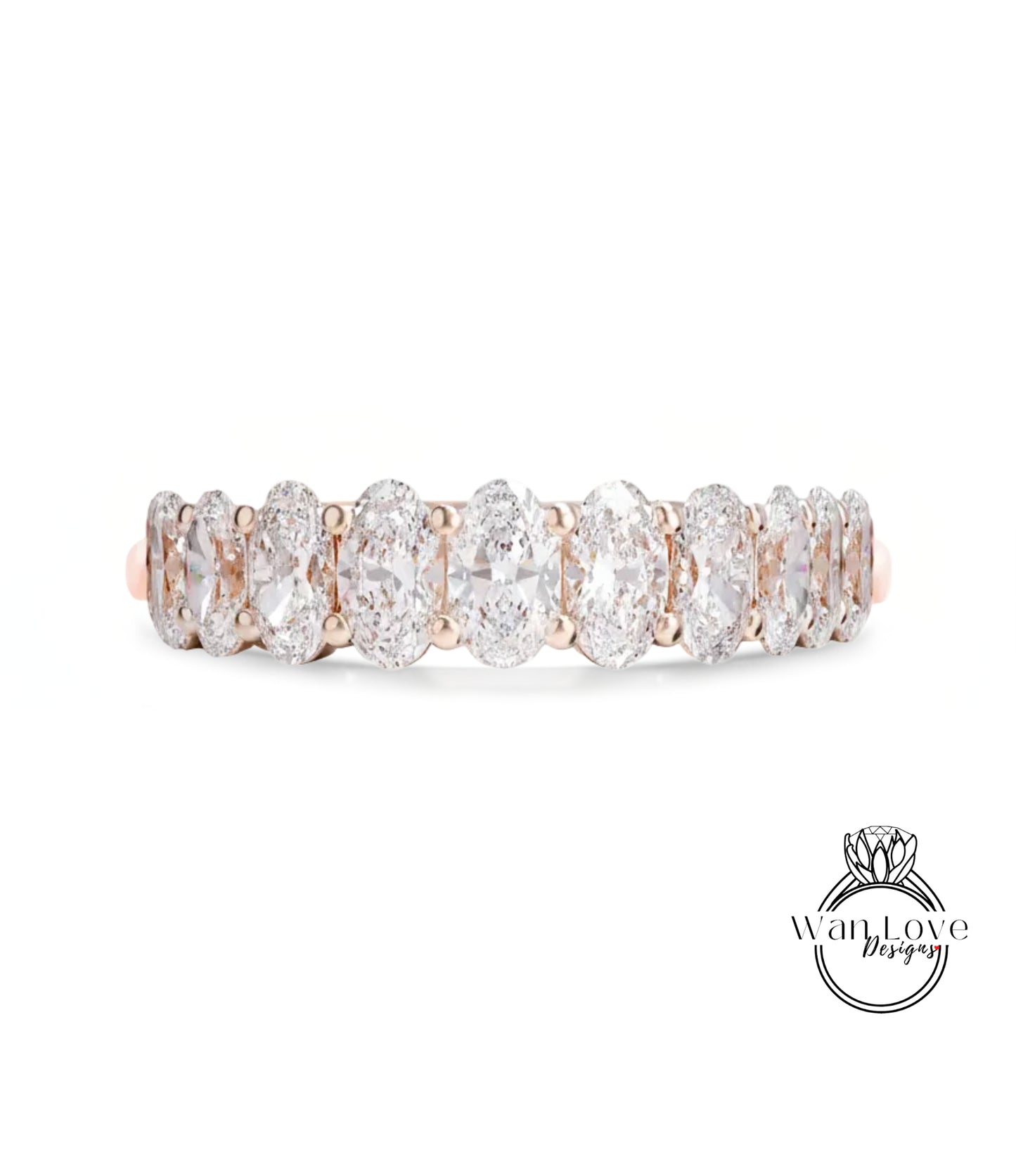 A row of oval-shaped diamonds set in a gold band.