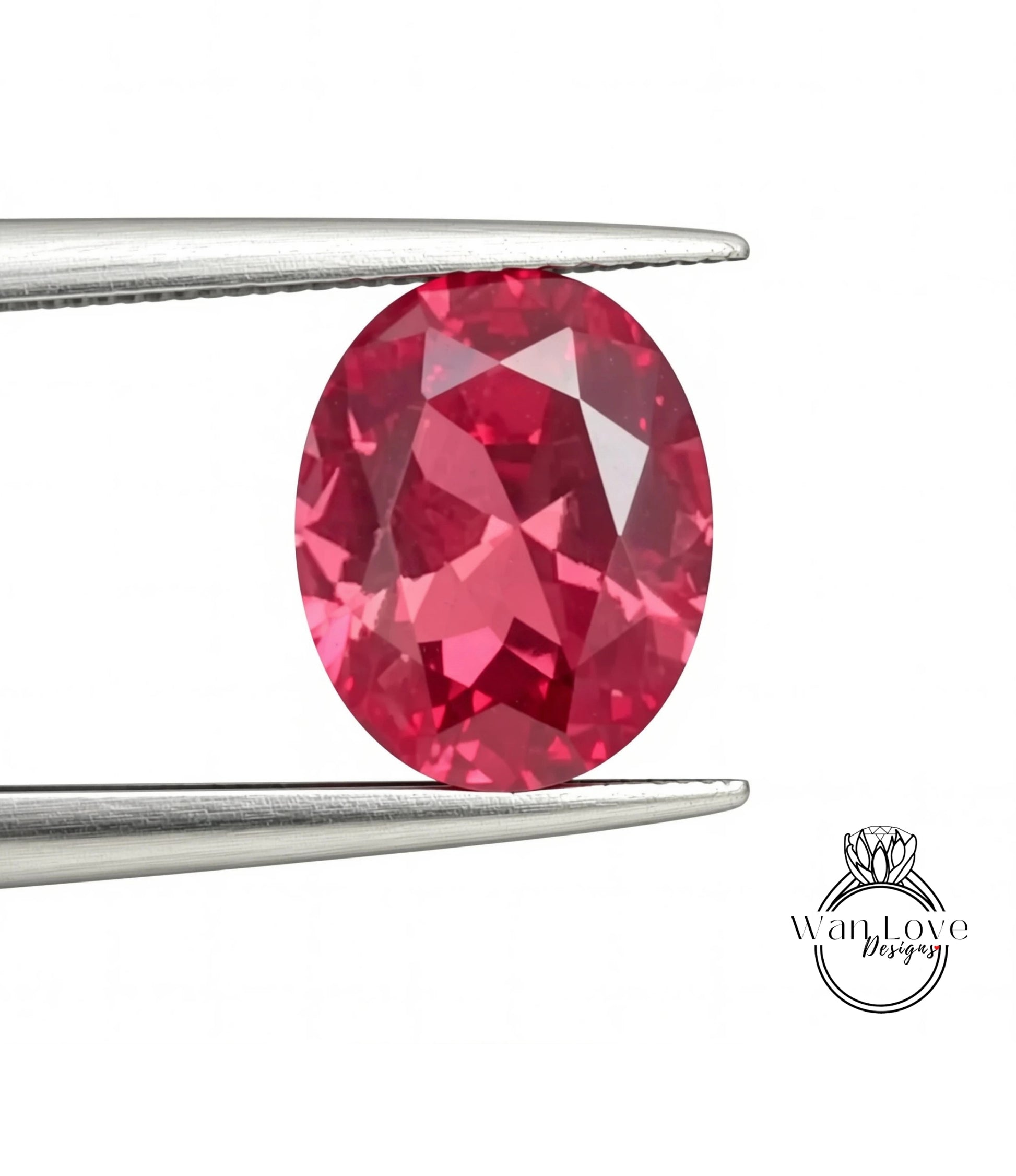 A close-up image of a large, bright red gemstone held in a pair of tweezers.