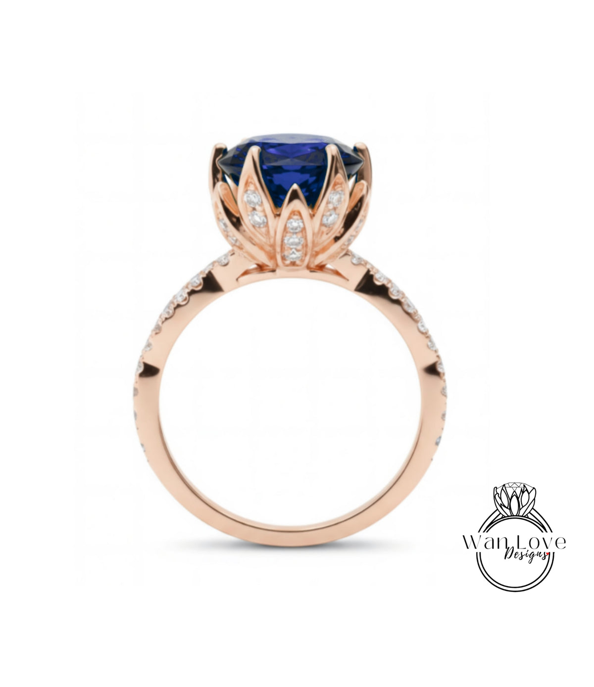 A rose gold ring with a large blue gemstone, likely a sapphire, at the center.