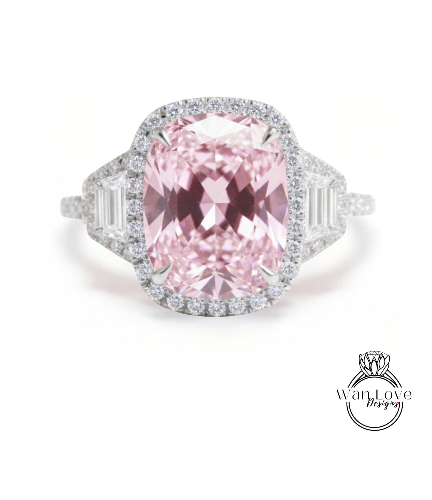A stunning pink diamond ring with a large central gemstone surrounded by smaller diamonds set in a halo of smaller diamonds.