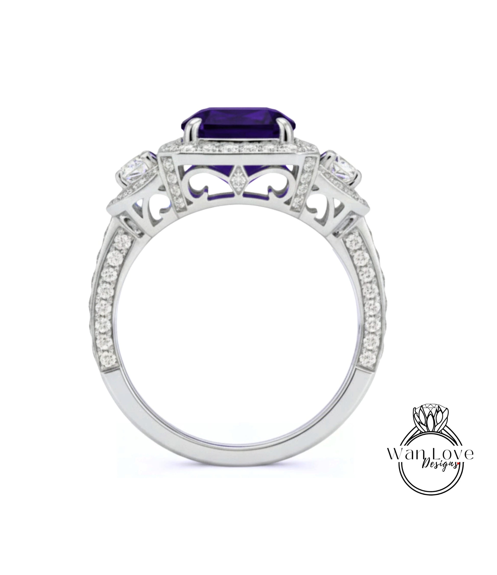 A silver ring with a large purple gemstone, surrounded by smaller diamonds and intricate designs.