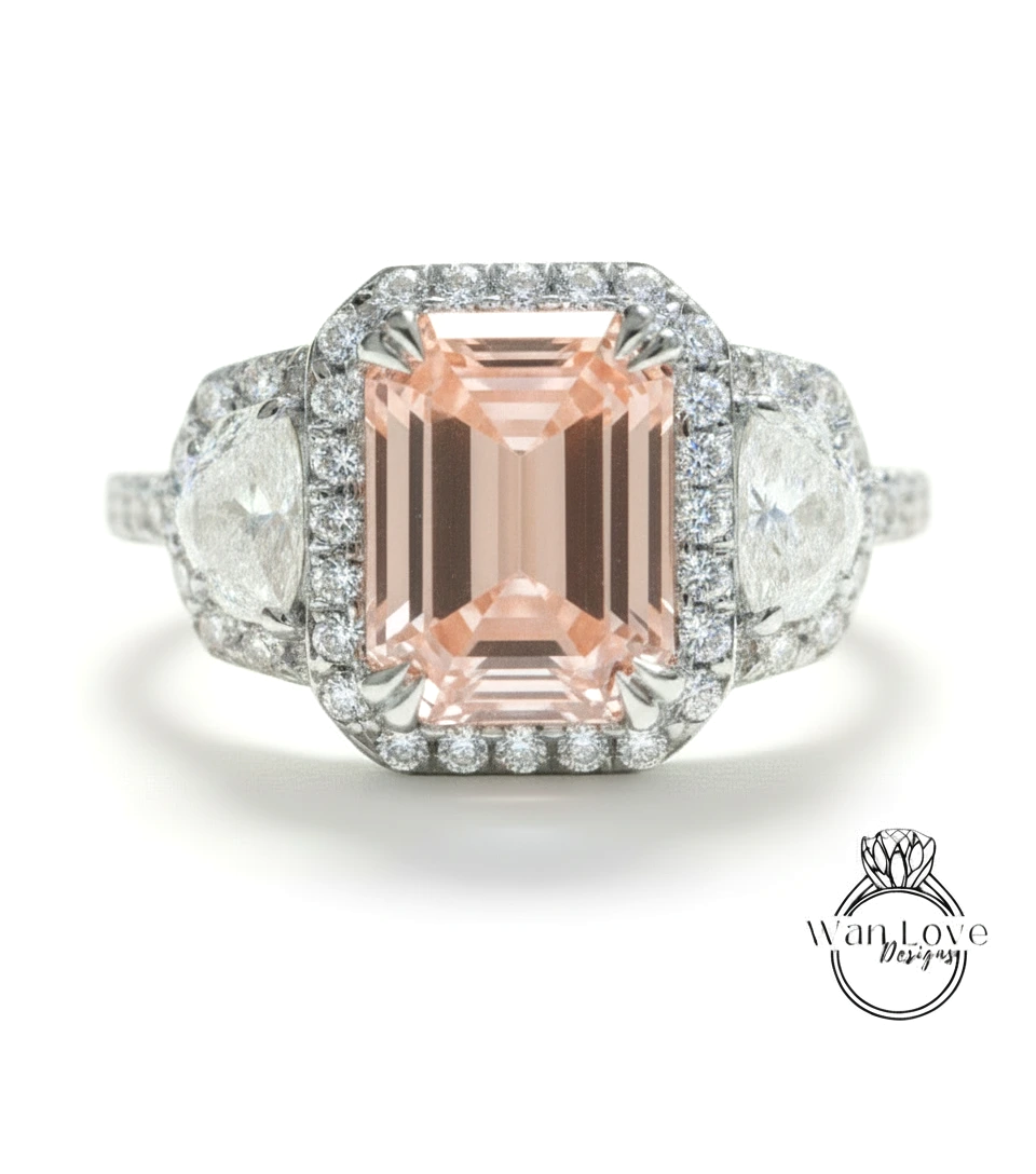 A stunning engagement ring with a large, pale pink gemstone surrounded by a halo of sparkling diamonds.