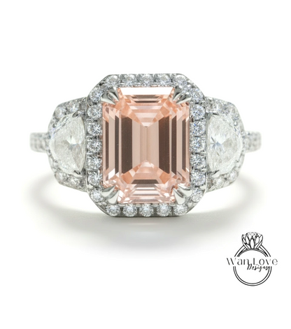 A stunning engagement ring with a large, pale pink gemstone surrounded by a halo of sparkling diamonds.