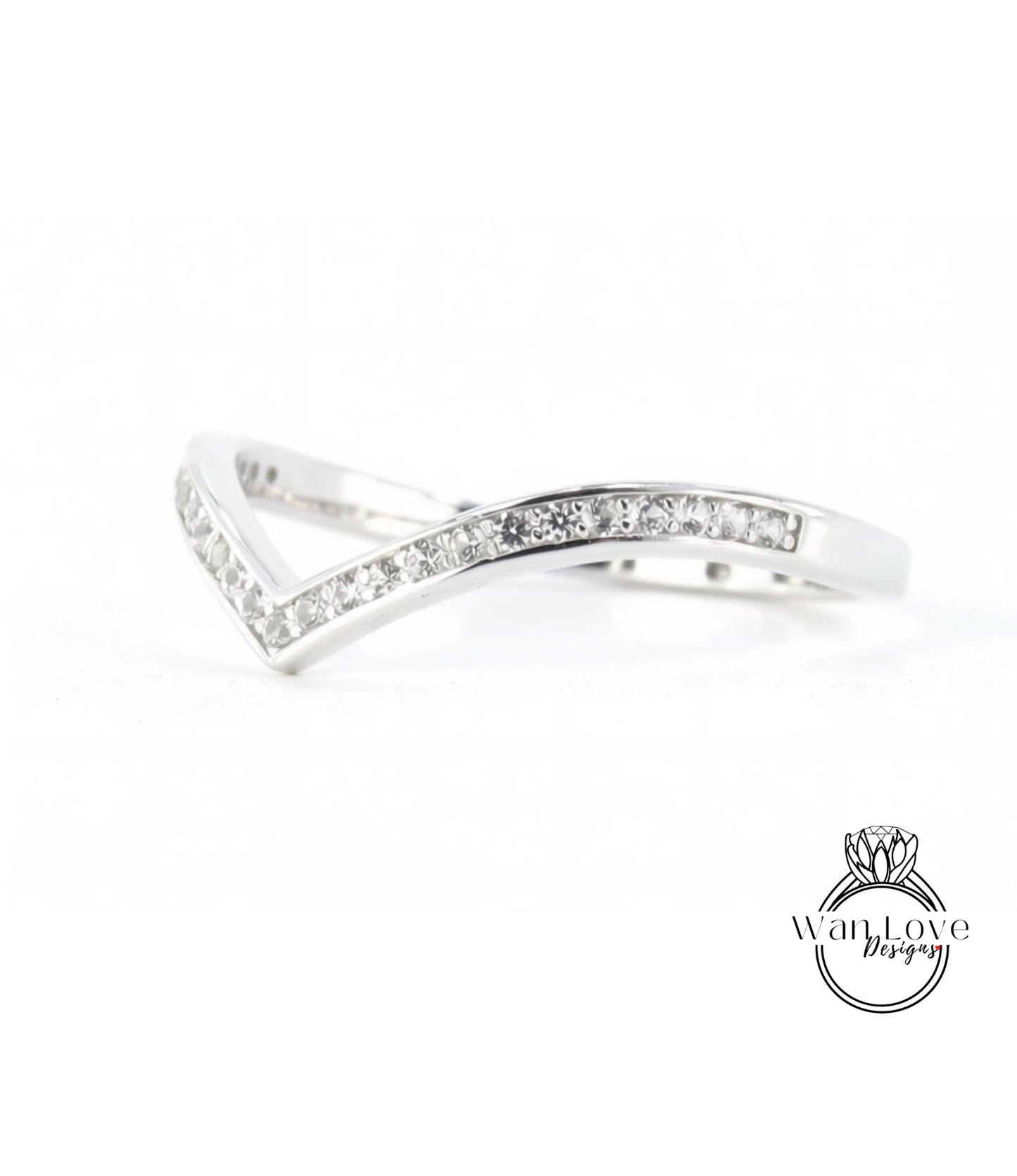 A silver ring with a diamond-encrusted band.