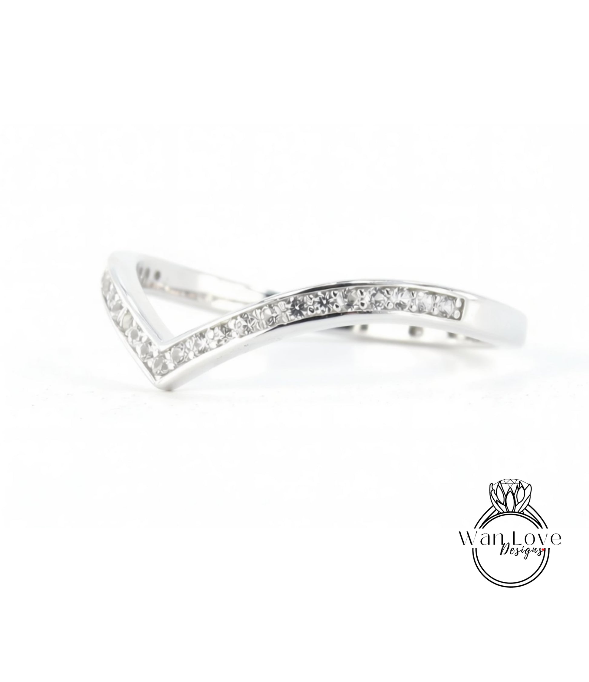A silver ring with a diamond-encrusted band.