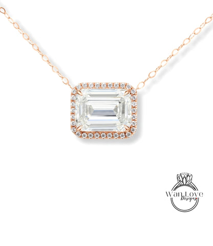 A necklace with a large, clear gemstone set in a halo of smaller diamonds.