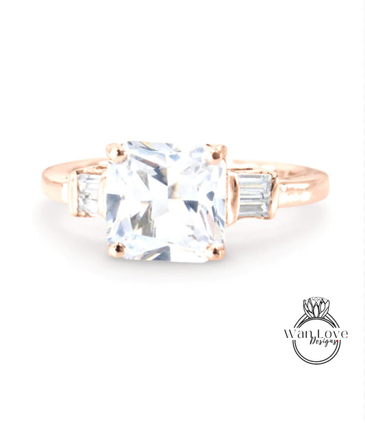 A beautiful engagement ring with a large, clear gemstone set in a rose gold band.