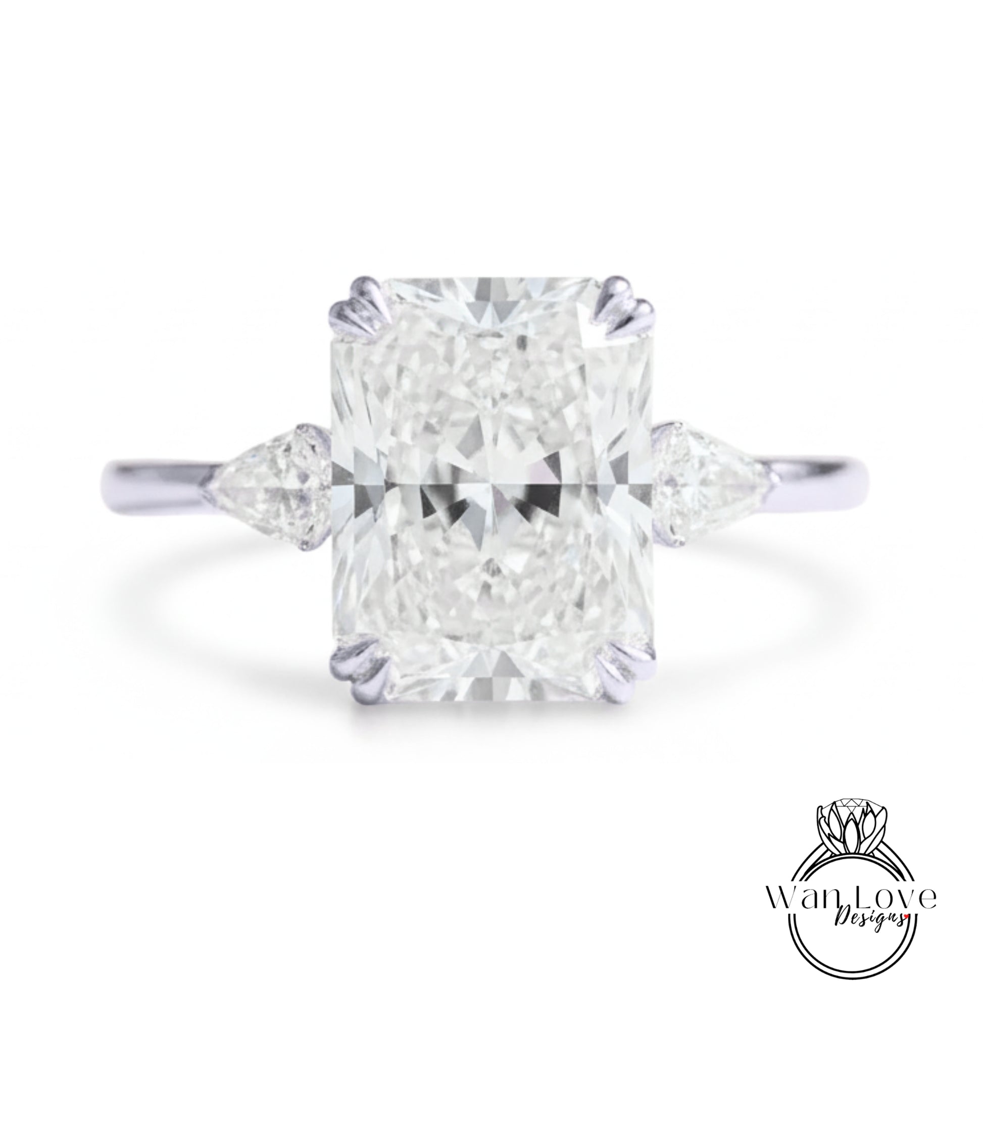A large, brilliant-cut diamond engagement ring with a prominent central diamond surrounded by smaller diamonds on either side.