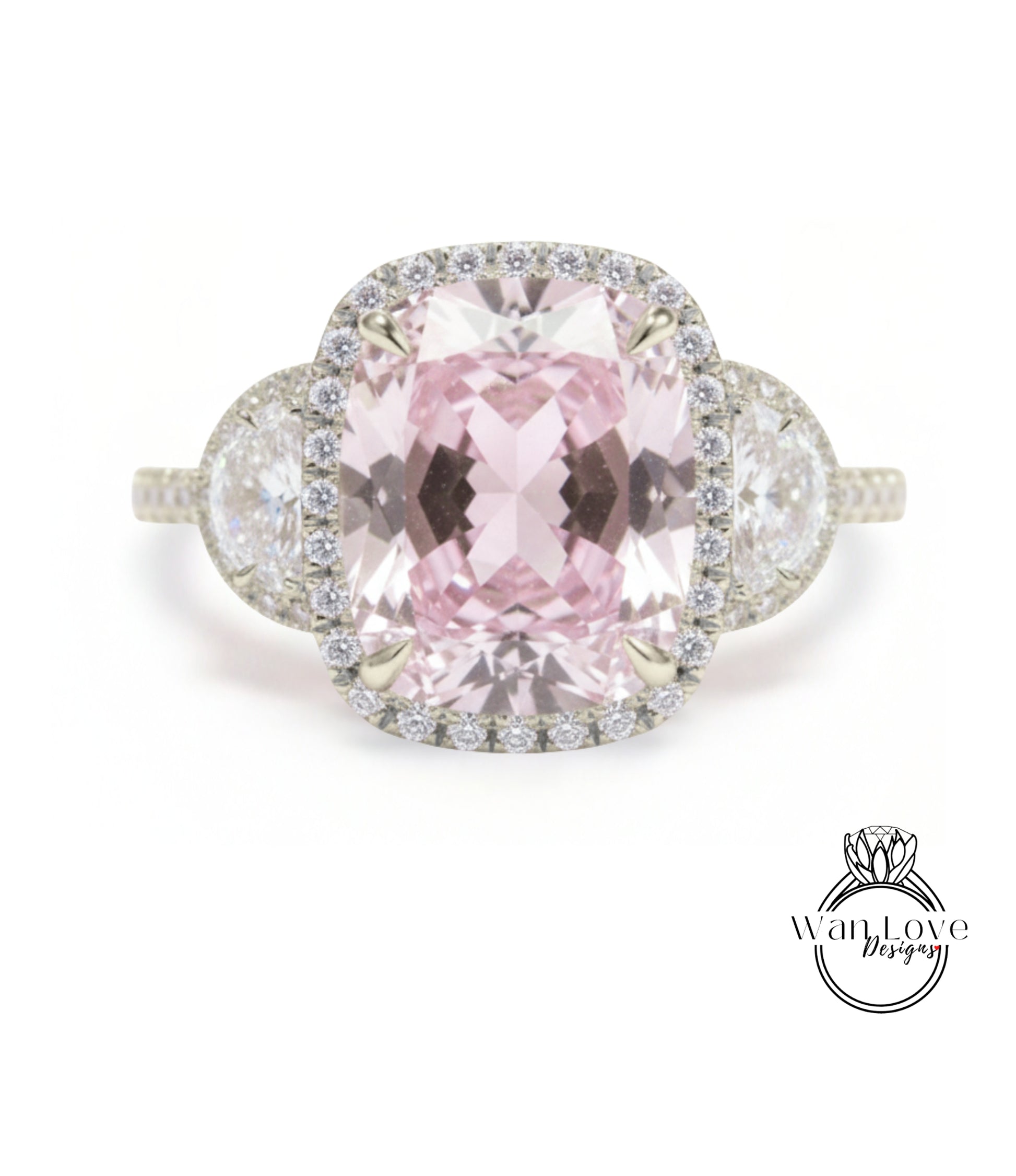 A large, pink gemstone ring with a halo of smaller diamonds around it.