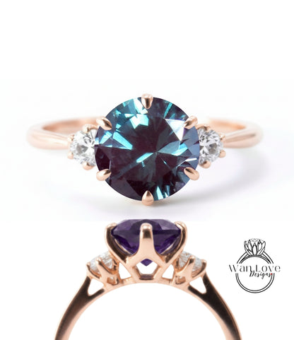 a gold ring with a large blue gemstone, likely a sapphire, set in a rose gold band.