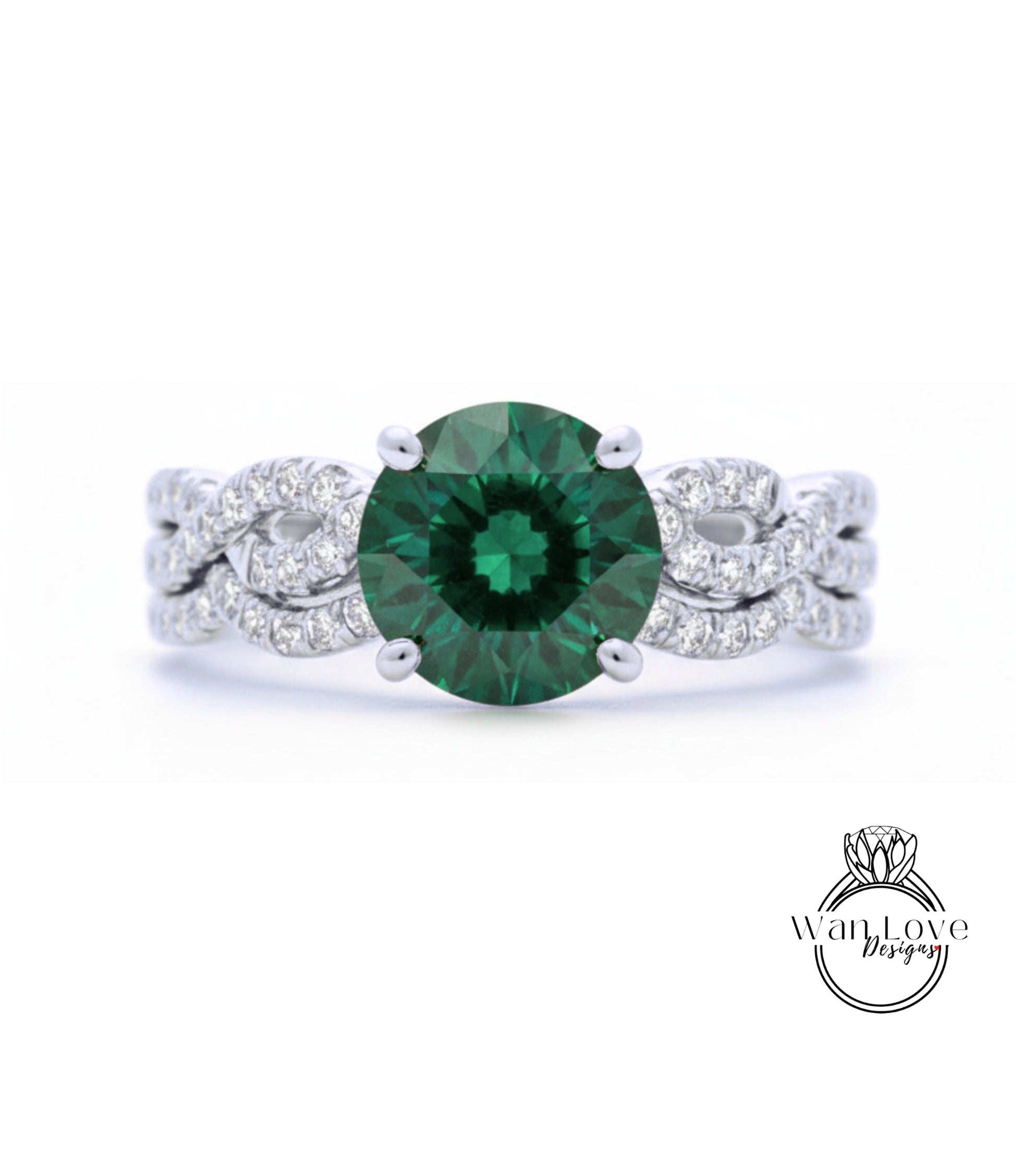 A close-up of a silver ring with a large, green gemstone at the center.