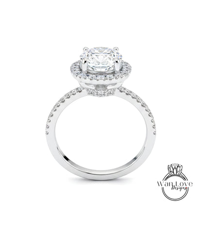A beautiful diamond engagement ring with a large central diamond surrounded by smaller diamonds on the band.