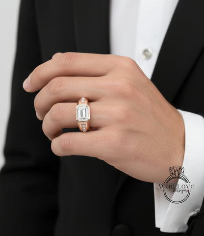 A close-up of a person's hand wearing a gold ring with a large diamond.