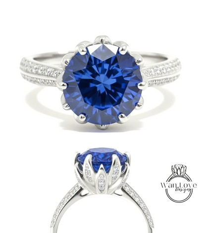 A stunning blue gemstone ring with a large central blue gemstone surrounded by smaller diamonds set in a silver band.