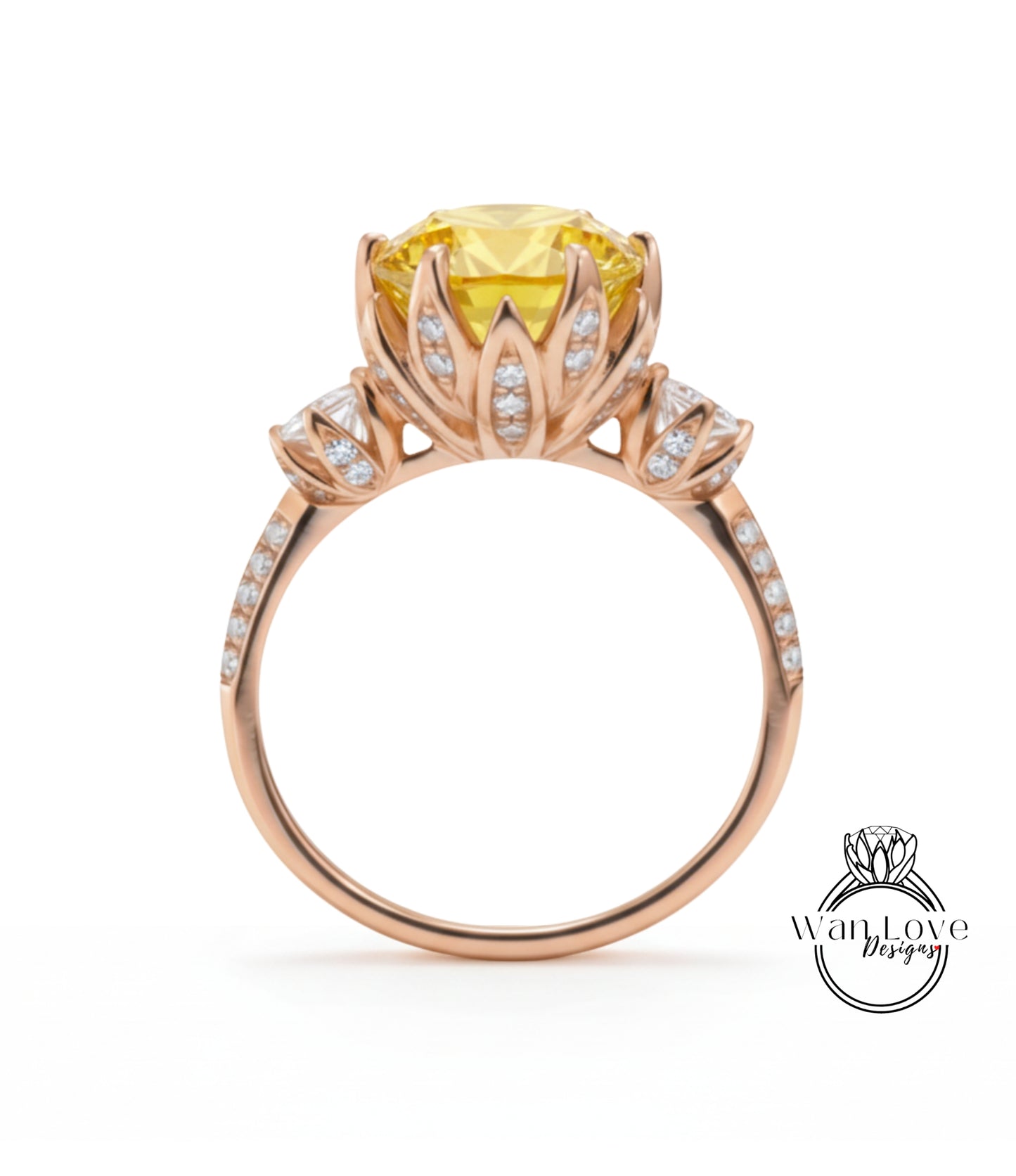 A gold ring with a large yellow gemstone, likely a diamond, set in a floral design with smaller diamonds around the edges.