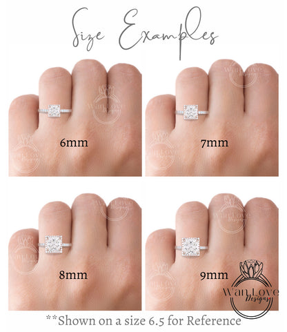 a woman's hand with four different sizes of engagement rings